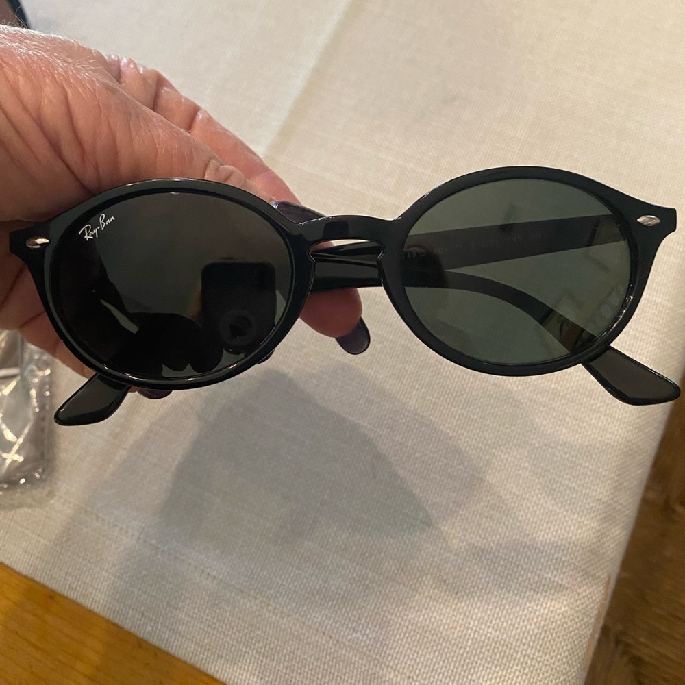 Ray-Ban sunnies.  Barely worn.  Case, cloth all in like new condition